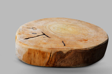 Wooden stump felled piece isolated podium background. Round cut tree with rings - beauty cosmetic concept - Clipping path