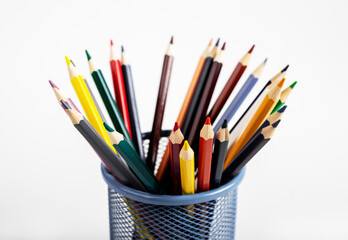 Fototapeta premium Colored pencils of different colour in metal holder