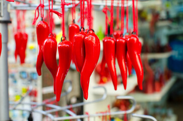 A traditional Neapolitan souvenir on the oudau - cornetto portafortuna. Red pepper or horn is one...