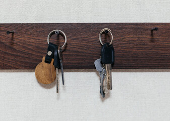 Key holder with keys hanging on the wal