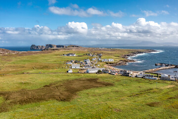 Aerial view of the settlement An Baile Thiar or West Town on Tory Island and harbour, County Donegal, Republic of Ireland © Lukassek