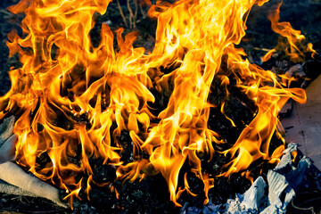 Burning old clothes after an infectious disease