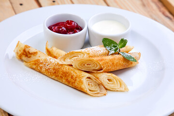 pancakes with jam and sweet sauce