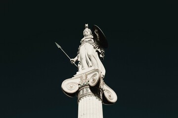 Statue of the ancient Greek Goddess Athena in front of the Academy of Athens in Athens, Greece.