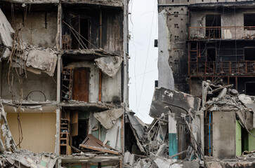 destroyed and burned houses in the city during the war in Ukraine