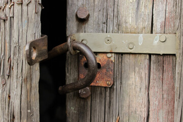 Large strap lock on the steel cable which is not broken apart.