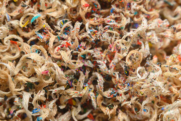 Sawdust of colored pencils as a background, texture, pattern.