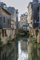 Fototapeta na wymiar Pont-Audemer, beautiful city in Normandy, typical half-timbered houses on the river 