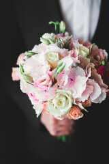 Beautiful wedding bouquet with different flowers, roses