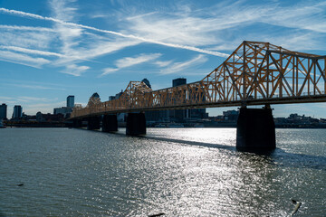Louisville, KY and the Abraham Lincoln and John F. Kennedy Bridges over the Ohio River as seen from the Clarksville/Jefferson, IN Area - obrazy, fototapety, plakaty
