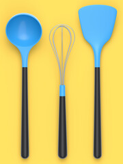 Silicon kitchen utensils like whisk, spoon and solid turner on yellow background