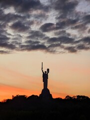 Motherland monument in Kyiv Ukraine at sunset