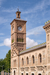 Close-up of the clock tower of the Toledo railway station, Toledo, Spain.