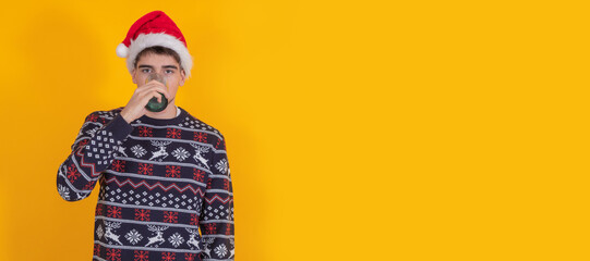 young santa claus isolated drinking