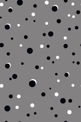 Abstract seamless pattern with black and white polka dots on a gray background. Lovely trendy background for packaging, wallpapers, textiles and interior decoration