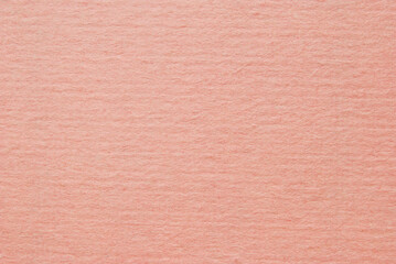 Light pink color craft paper texture as background
