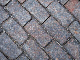 A pattern of cobblestones on the pavement.Paving stones on Red Square.  Background of stone.