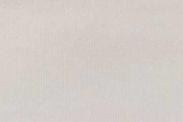 Fototapeta premium Beige canvas, fine beige fabric texture as background 