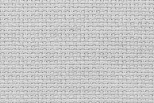 White canvas fabric for background, a surface of a white cross-stitch canvas as background