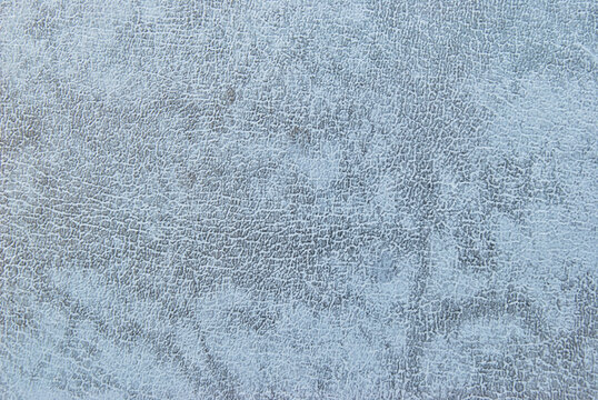 Light blue fine two-tone leather texture pattern as background