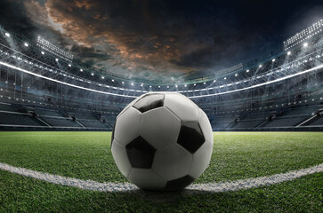 Fototapeta premium Sports football Background. Soccer ball at the sports stadium.