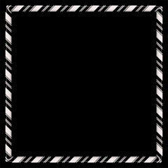 Obraz premium Black and white candy cane frame on black background 