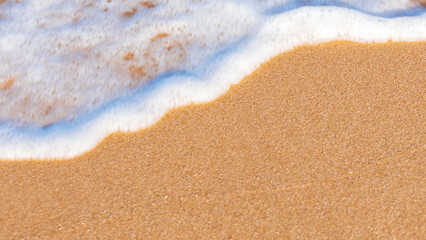 Fototapeta na wymiar sandy beach sea water on a sunny summer day