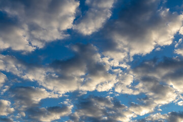 Gray white puffy stratus clouds