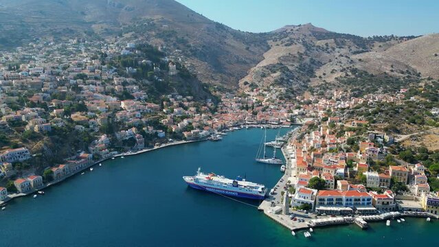 Symi is a Greek island, part of the Dodecanese island group. It&rsquo;s known for its beaches, an annual music festival and for the harbor at Symi Town, surrounded by colorful neoclassical houses.