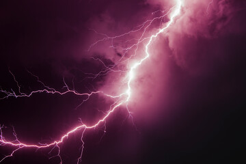 a powerful discharge of purple linear lightning against a dark sky at night