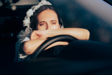 Unhappy Bride Crying in Her Car Cancelling her Wedding. Heartbroken woman about to be married having doubts and regrets
