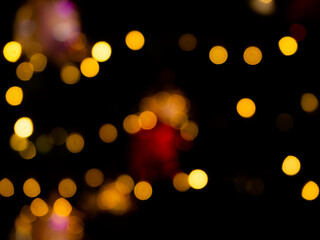 Fototapeta premium Light Night Bokeh dark Black Background,Abstract Orange Blue Colorful Circle Effect Sparkle Blurry Backdrop,for Invitation Special Gala,Birthday Card,Christmas Holidays Celebration,Happy New Year 2023