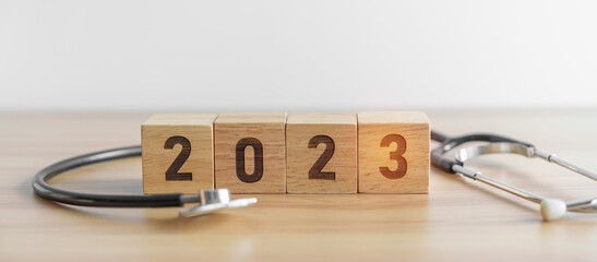 2023 Happy New Year for health care, Insurance, Wellness and medical concept. Stethoscope of doctor...