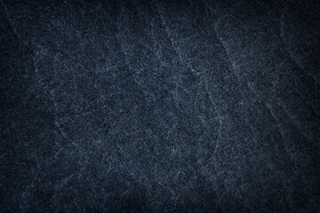 Dark grey stone / black slate stone background or texture