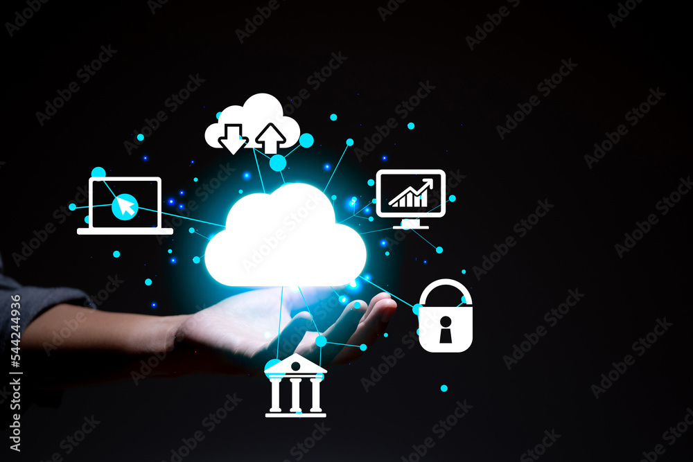 Leinwandbilder Hand holding a virtual cloud icon on a black background. The cloud technology system is computing and sharing management for uploading, downloading, and transferring information and applications.