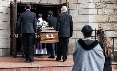 Death, funeral and people with coffin to church, chapel service and ceremony for temple ritual....