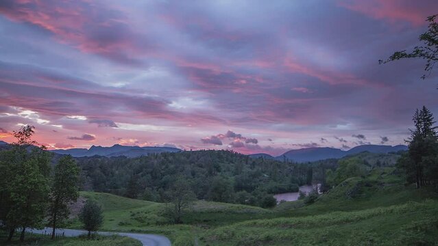 Tarn Hows, Lake District National Park, Amazing orange and red sunset timelapse. June 2022. Unesco World Heritage, Coniston Water