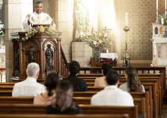 Priest, pastor and spiritual man in church sermon, prayer and speech to catholic people, worship...