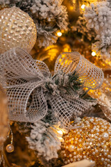 Gold ball decoration on christmas tree. Christmas baubles on christmas tree