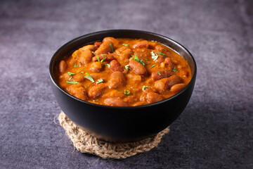 Kidney bean curry or rajma or rajmah chawal and rice roti, typical north Indian food main course....
