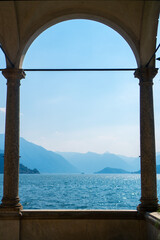 Scenic view to Lake Como and the Bellagio peninsula on a sunny summer day visible from Villa Monastero in Varenna, Province of Lecco, Italy.