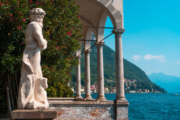 Beautiful old sculpture in the famous Villa Monastero with gorgeous lakefront gardens and spectacular Lake Como views in Varenna, Province of Lecco, Italy.