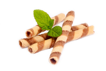Chocolate wafer stick roll isolated on white background (Turkish name; rulokat or rulo tatli cubuk)