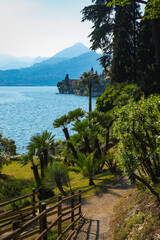 Stunning view of the famous luxury Villa Monastero with gorgeous lakefront gardens and spectacular Lake Como views in Varenna, Province of Lecco, Italy.