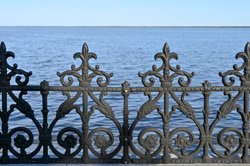 Fence in front of the Dnieper River in the park 