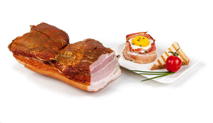 Fried egg with bacon on a white background