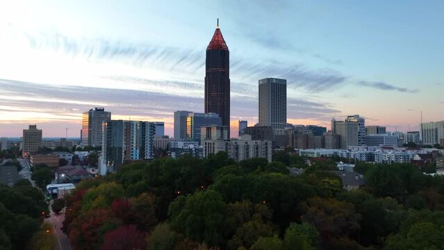 City skyscrapers in downtown Atlanta at night. Aerial during sunset.