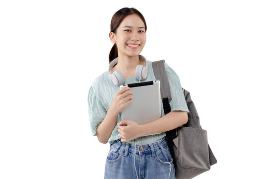 Happy Young Asian student girl holding tablet computer PNG file format transparent background.