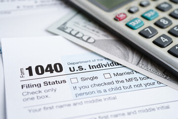 Tax form 1040 U.S. Individual Income Tax Return, business finance concept.
