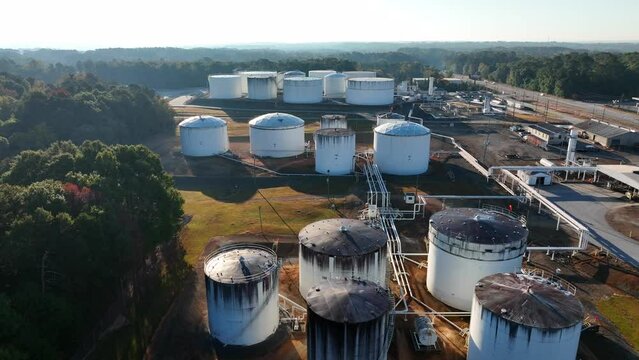 Fuel terminal in USA. Aerial view of tanks of gasoline and diesel. Fossil fuel reliance theme.